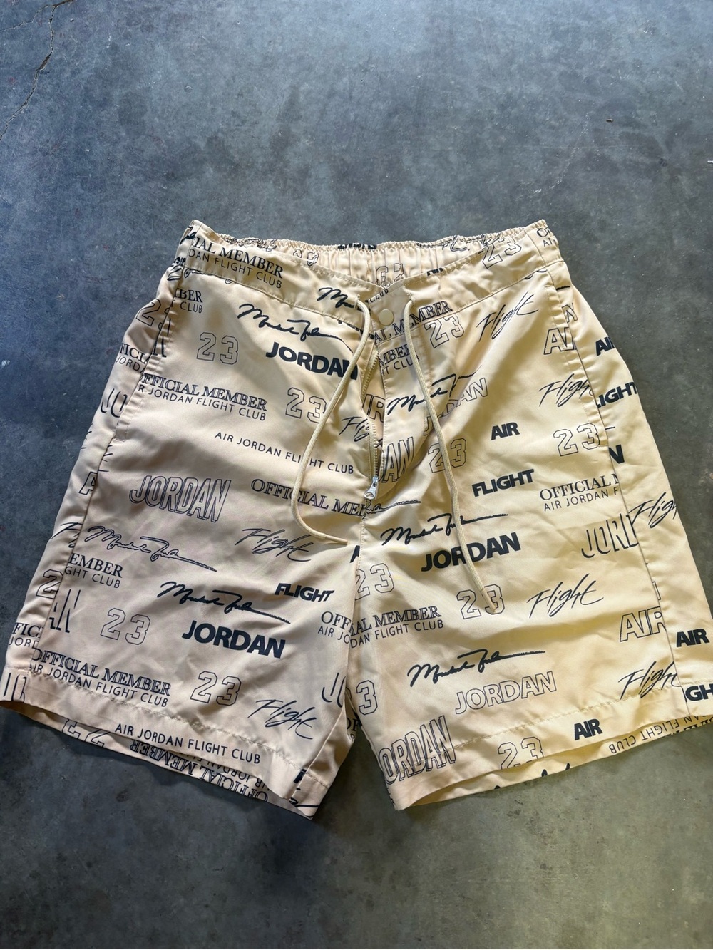 Jordan Men's Tan All-Over Logo Athletic Shorts